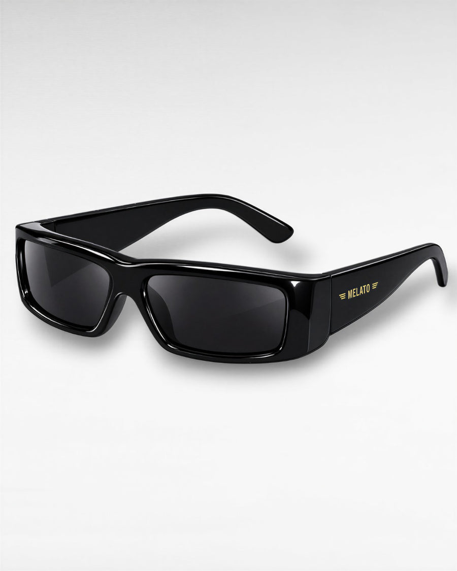 Melato Blacklist black rectangle sunglasses with dark lenses and gold MELATO temple branding, three-quarter product view