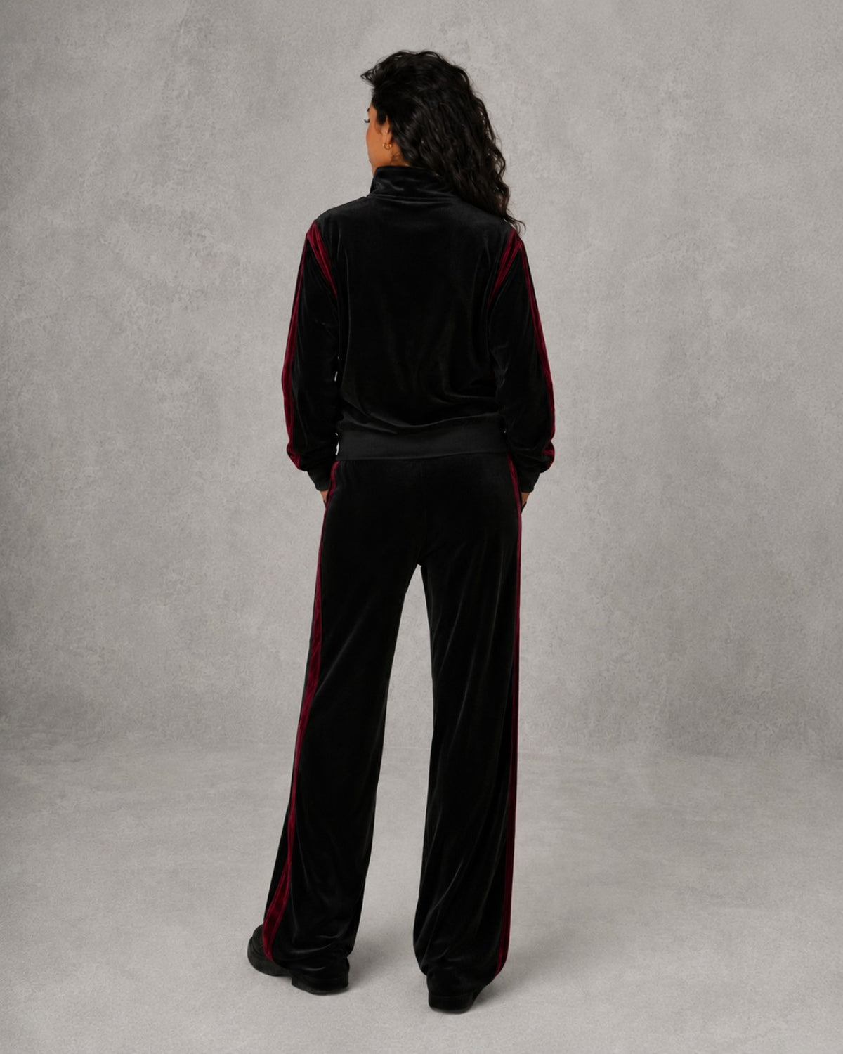 Black Cherry velour track set on model, back view