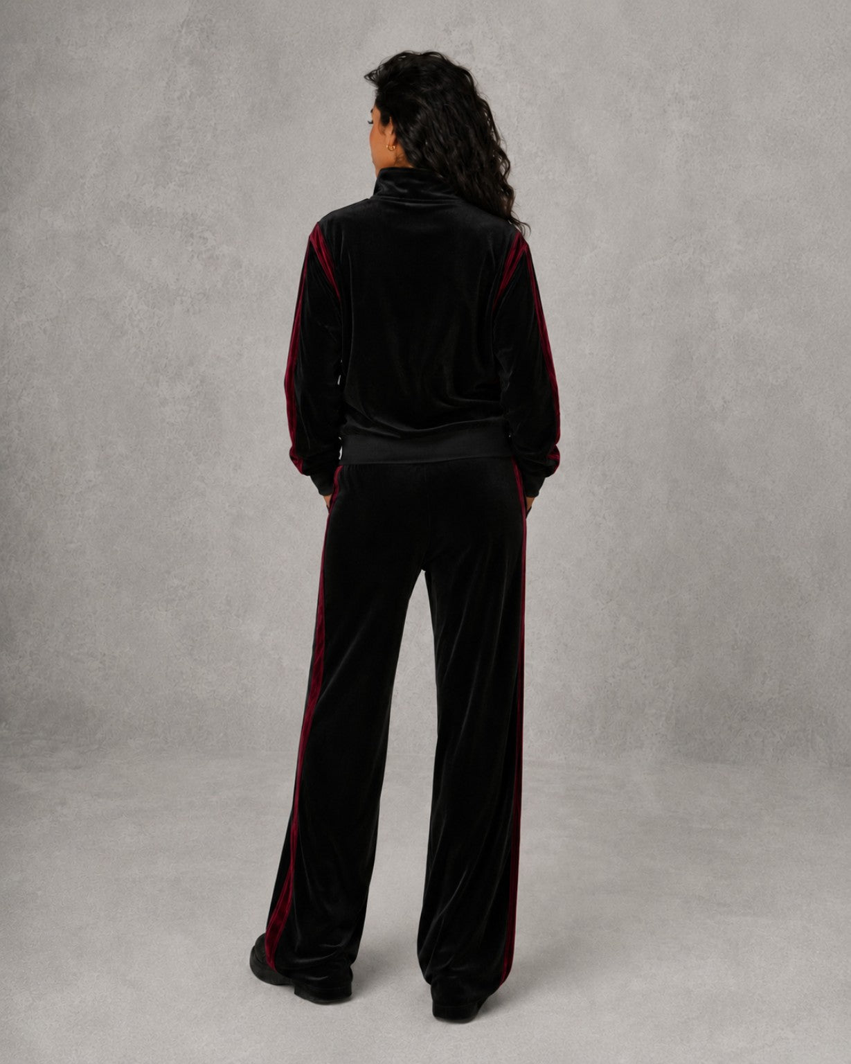 Black Cherry velour track set on model, back view