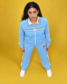 Reasonable Doubt Track Jacket - Model Posing - powder blue with ivory bands