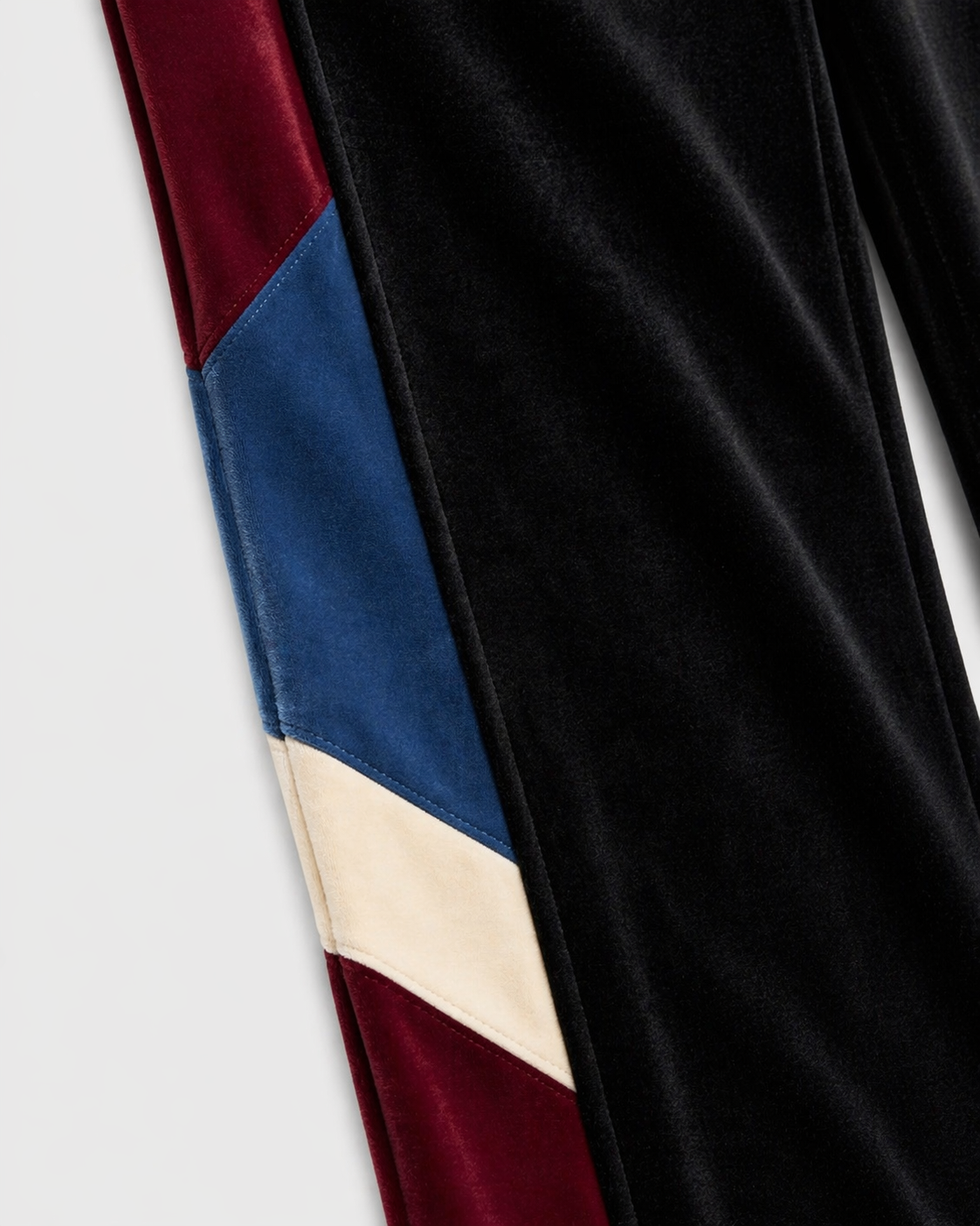 Melato Divididos Velour Track Pant side view — colorblock velour pants