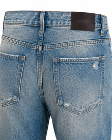 Melato Hendrix Distressed Flare Jean fabric detail — distressed denim finish