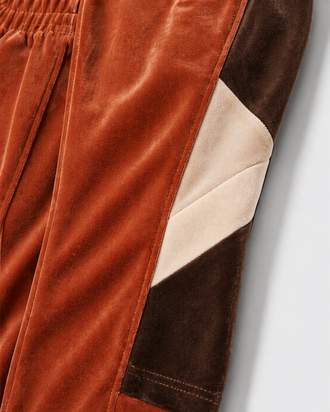 Melato Passion Fruit Velour Track Pant side view — premium streetwear pants