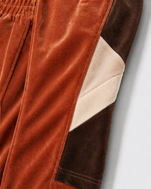 Melato Passion Fruit Velour Track Pant side view — premium streetwear pants