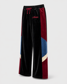 Melato Divididos Velour Track Pant detail shot — structured streetwear pants