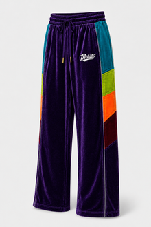 Melato Conquista Velour Track Pant close up — structured streetwear