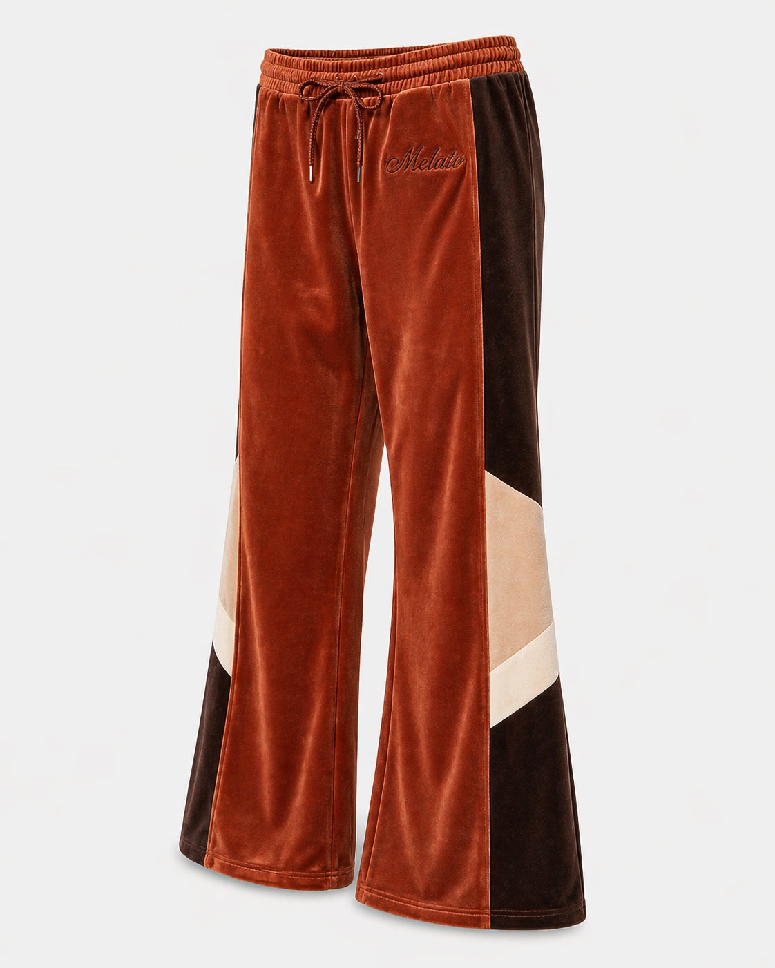 Melato Passion Fruit Velour Track Pant close up — premium velour paneling